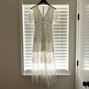 Bridal, white dress. Great for rehearsal dinner or pictures. Never worn.